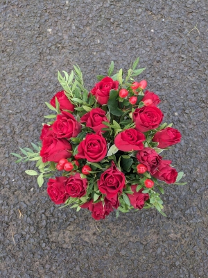 Filled Grave  pot  red roses and berries