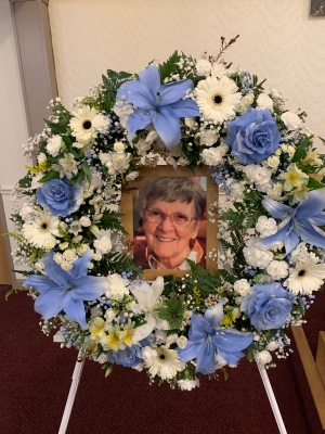 Specialist photograph wreath tribute on stand