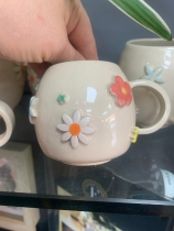 Hand made pottery cup