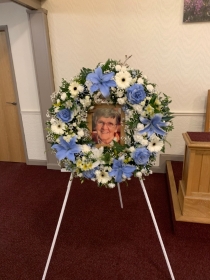 Specialist photograph wreath tribute on stand